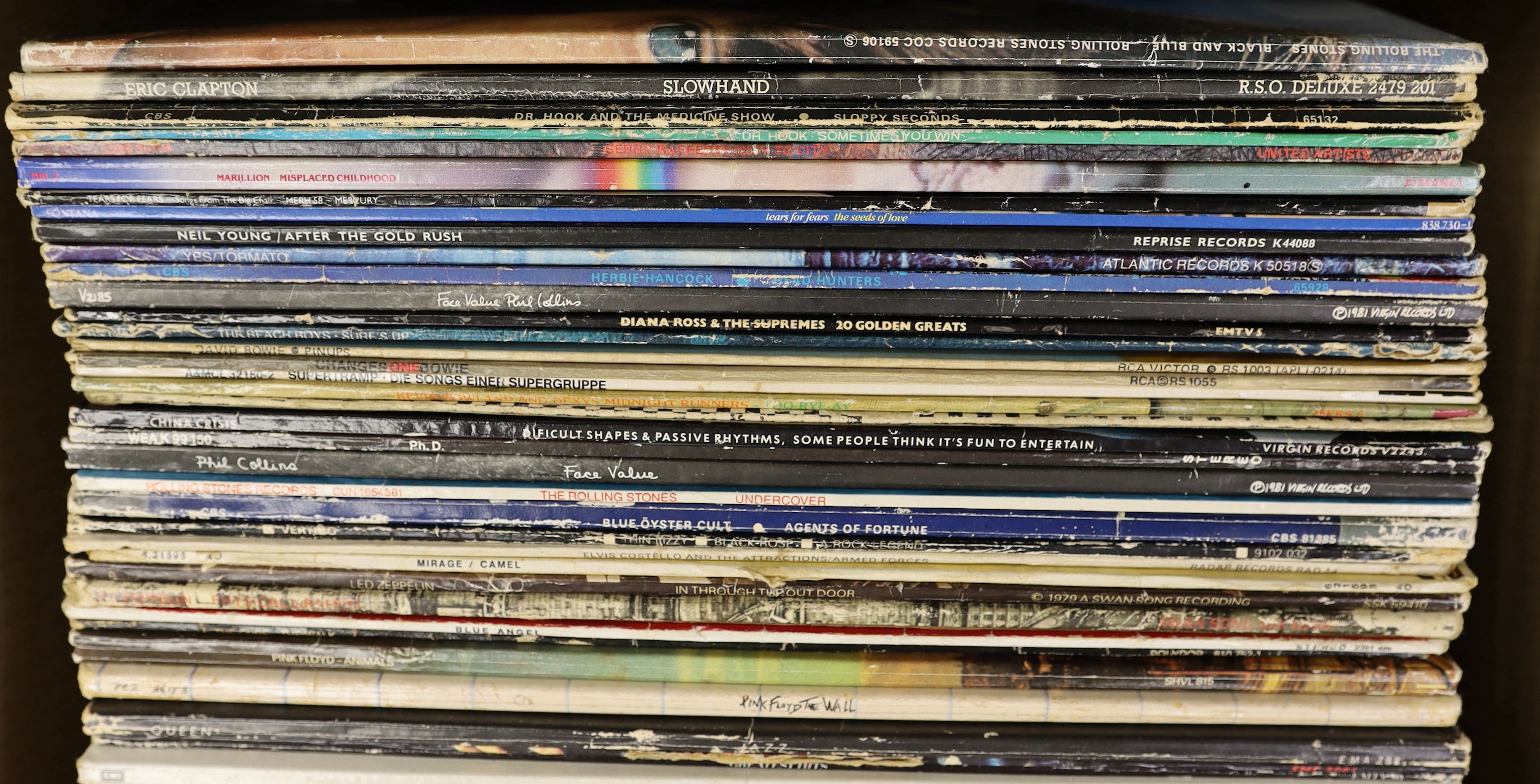 Fifty-eight mostly 1970's/80's LPs etc., including Dr. Hook, Marillion, Neil Young, Yes, T-Rex, Phil Collins, Diana Ross, David Bowie, Supertramp, Camel, Led Zeppelin, Pink Floyd, Queen, etc. notable albums include; In T